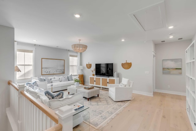 living room with light hardwood / wood-style floors