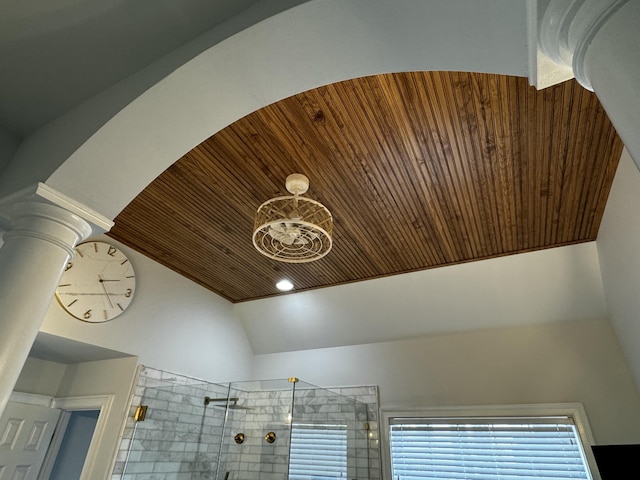 interior details featuring wood ceiling and decorative columns