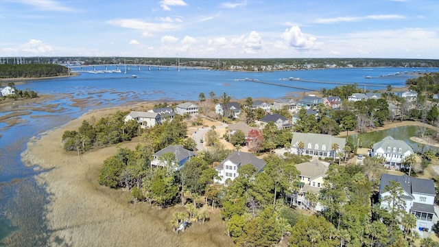 bird's eye view with a water view and a residential view