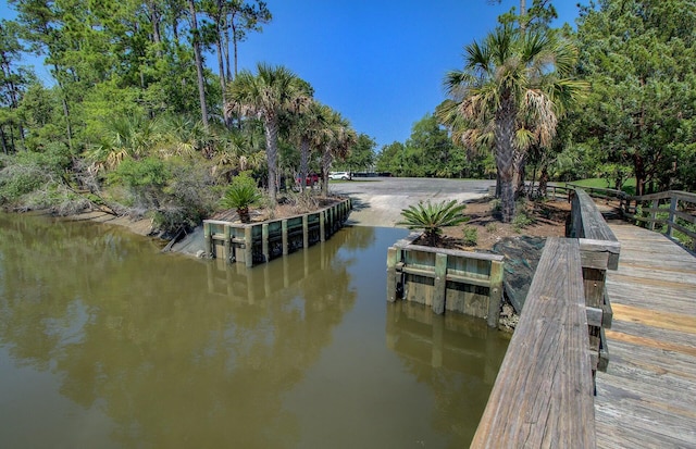 dock area featuring a water view