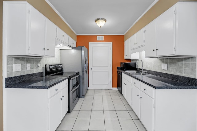 kitchen featuring dark countertops, white cabinetry, a sink, light tile patterned flooring, and black appliances