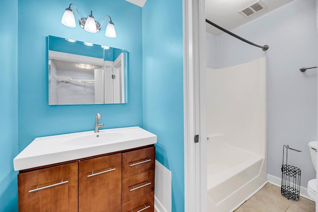 full bath with shower / bath combination, visible vents, toilet, tile patterned floors, and vanity