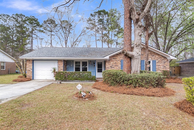 view of front of house featuring brick siding, a shingled roof, a front lawn, driveway, and an attached garage