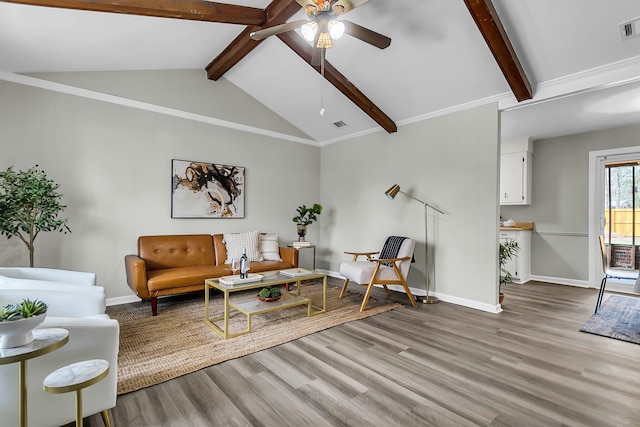 living area featuring visible vents, lofted ceiling with beams, wood finished floors, baseboards, and ceiling fan