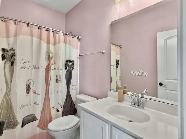 full bathroom with toilet, vanity, and a shower with curtain