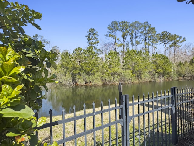 view of water feature with fence