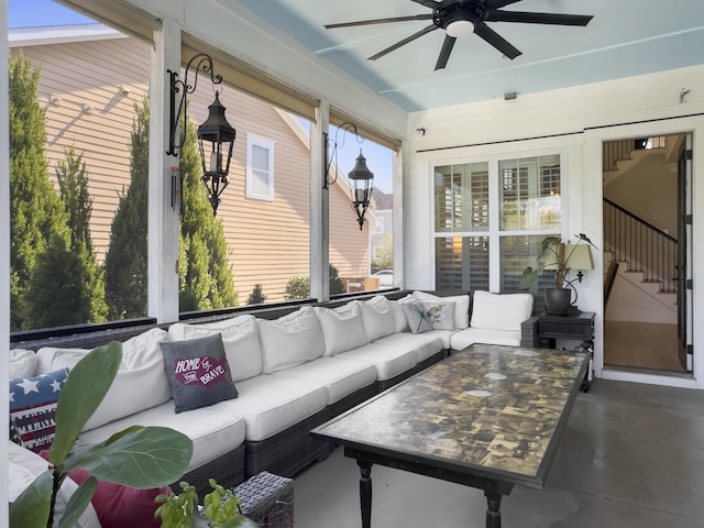 exterior space with ceiling fan