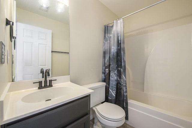 full bathroom featuring vanity, shower / tub combo with curtain, and toilet