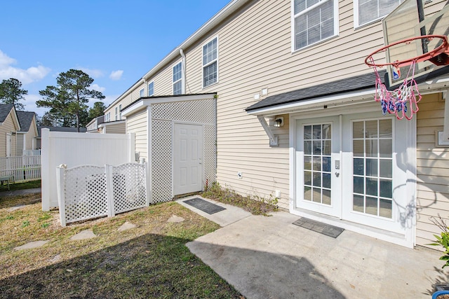 rear view of house with a patio and french doors