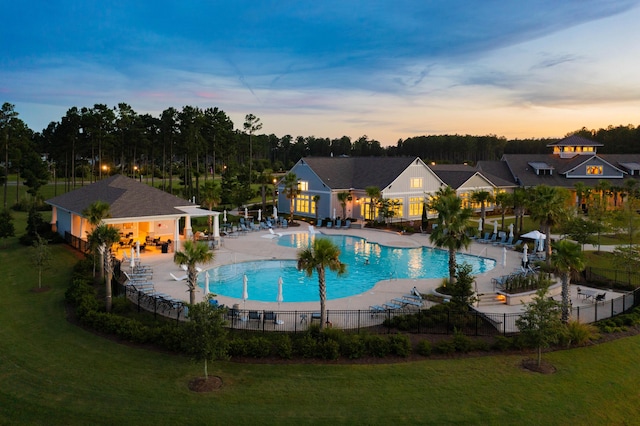 629 Marsh Cove Cir, Summerville, SC 29486 - pool at dusk with a community pool and a patio area