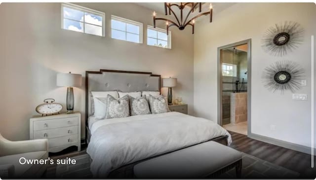 629 Marsh Cove Cir, Summerville, SC 29486 - bedroom featuring a chandelier, multiple windows, ensuite bathroom, and wood finished floors