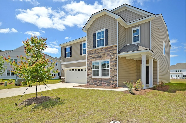 644 Red Monarch Way, Moncks Corner, SC 29461 - craftsman house with concrete driveway, stone siding, a garage, and a front lawn
