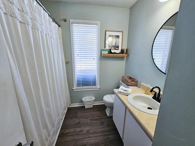837 Club Cottage Rd, Edisto Island, SC 29438 - full bath with vanity, wood finished floors, and a shower with curtain