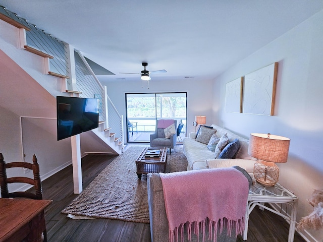 837 Club Cottage Rd, Edisto Island, SC 29438 - living room with stairway, wood finished floors, and a ceiling fan