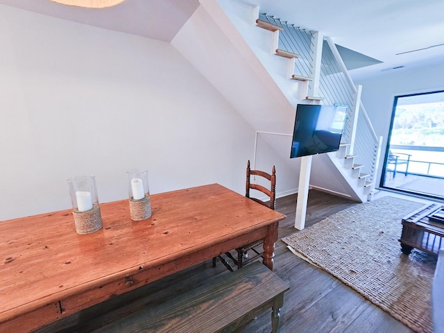 837 Club Cottage Rd, Edisto Island, SC 29438 - dining space with stairs and wood finished floors
