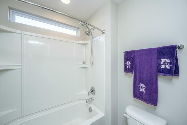 bathroom with toilet, a wealth of natural light, and shower / tub combination