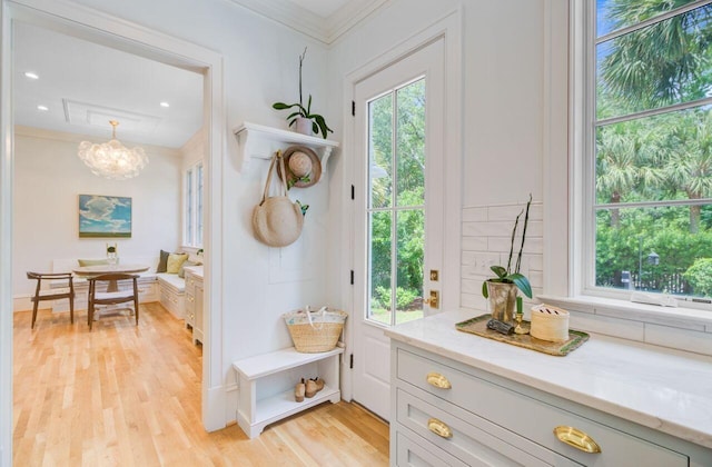 62 Eastlake Rd, Mount Pleasant, SC 29464 - interior space with a chandelier, ornamental molding, light wood finished floors, and recessed lighting