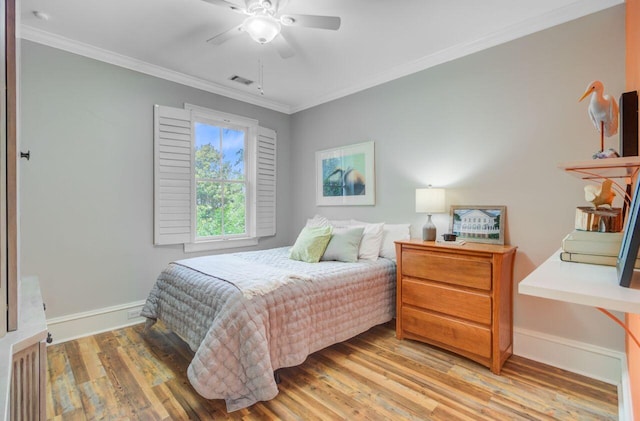 62 Eastlake Rd, Mount Pleasant, SC 29464 - bedroom featuring light wood-style flooring, ornamental molding, baseboards, and a ceiling fan