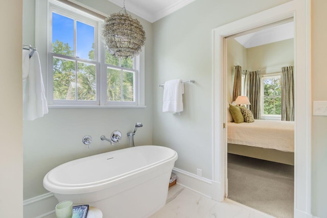 62 Eastlake Rd, Mount Pleasant, SC 29464 - full bath featuring a freestanding tub, marble finish flooring, crown molding, ensuite bathroom, and baseboards