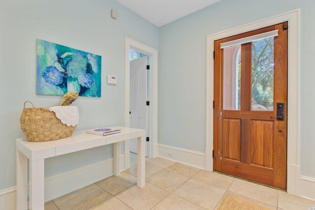62 Eastlake Rd, Mount Pleasant, SC 29464 - entrance foyer with light tile patterned floors and baseboards