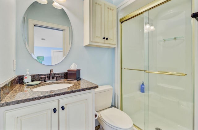 62 Eastlake Rd, Mount Pleasant, SC 29464 - bathroom featuring a stall shower, vanity, and toilet