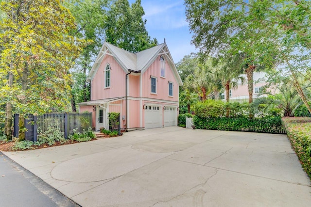 62 Eastlake Rd, Mount Pleasant, SC 29464 - view of front facade with a garage and driveway