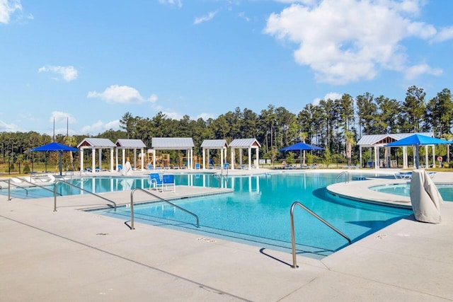 community pool with a patio