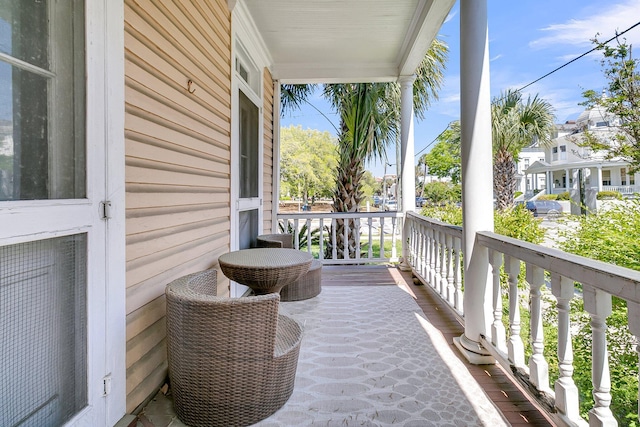 balcony featuring a porch