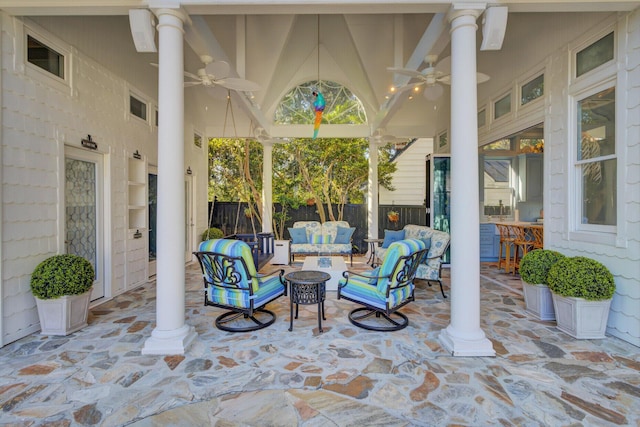 view of patio with outdoor lounge area and ceiling fan