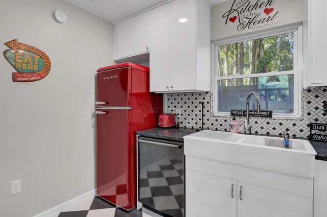 kitchen featuring decorative backsplash, wine cooler, sink, white cabinetry, and fridge