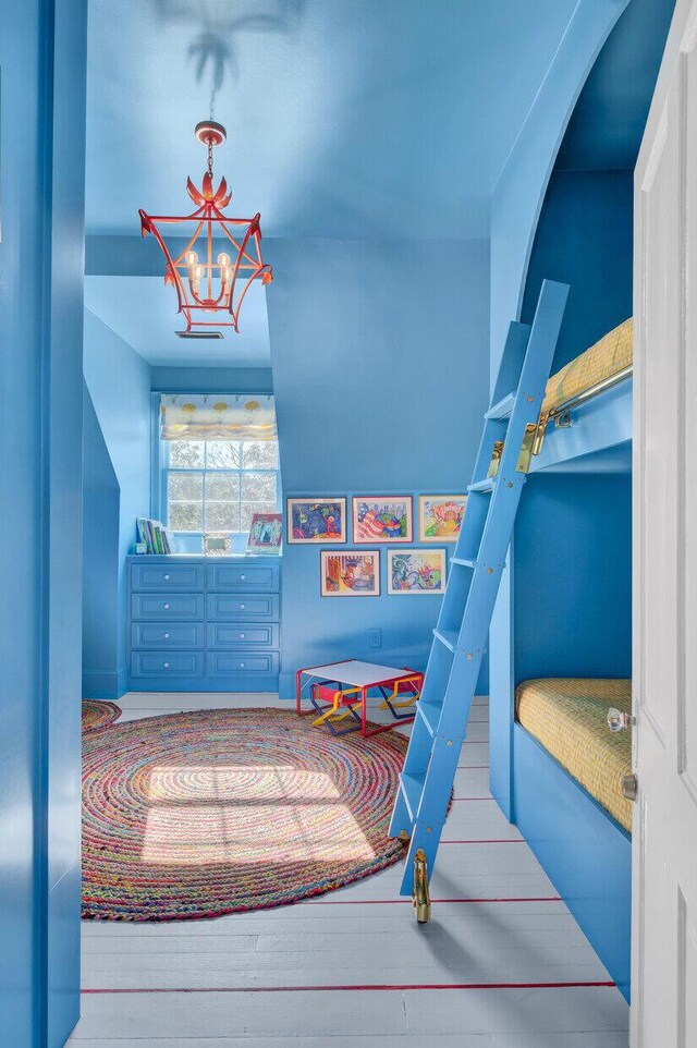 bedroom featuring wood-type flooring