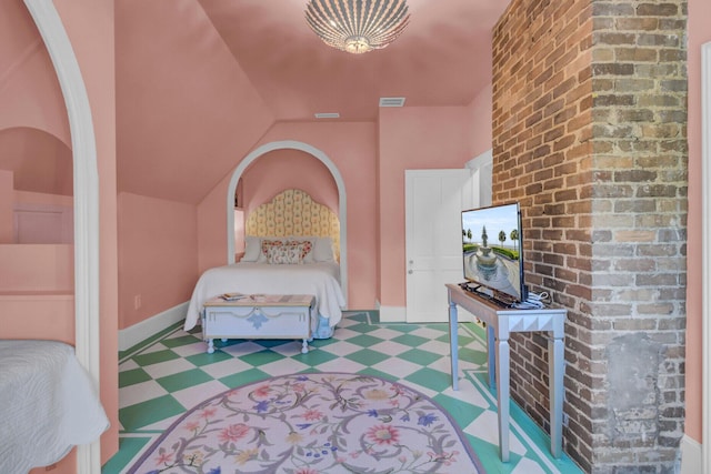 unfurnished bedroom featuring vaulted ceiling