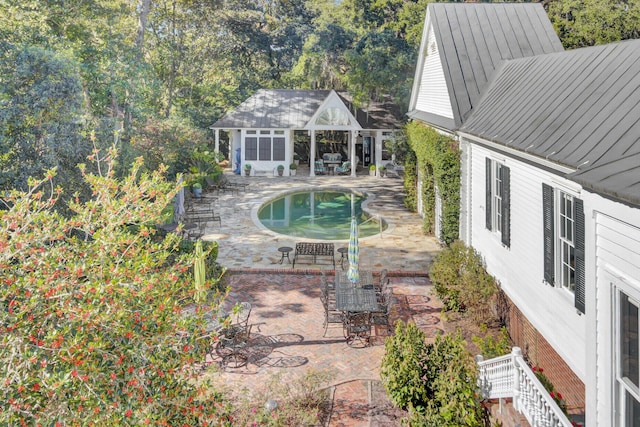 view of pool with a patio area