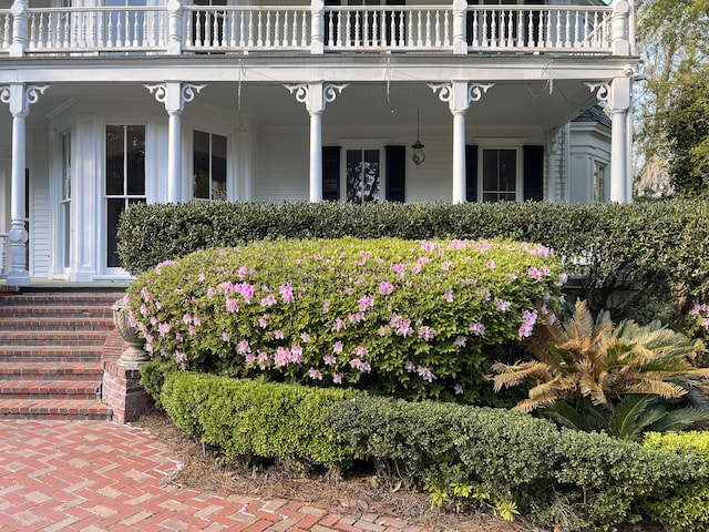 doorway to property featuring a balcony