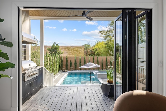 view of pool featuring area for grilling