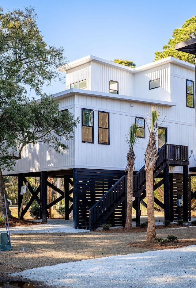 view of front of property featuring stairs