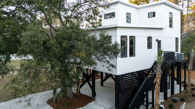 view of home's exterior featuring cooling unit