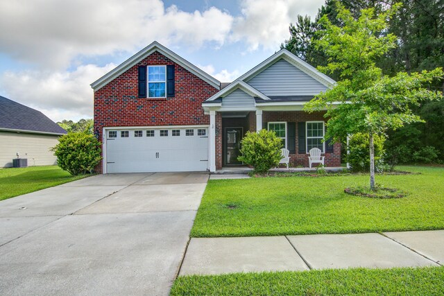 3639 Pimmit Pl, Ladson, SC 29456 - view of front of home featuring brick siding, covered porch, concrete driveway, an attached garage, and a front lawn