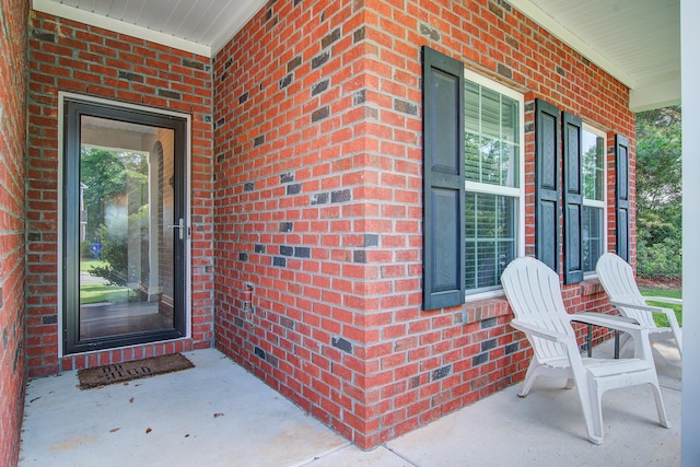 3639 Pimmit Pl, Ladson, SC 29456 - view of exterior entry with a porch and brick siding
