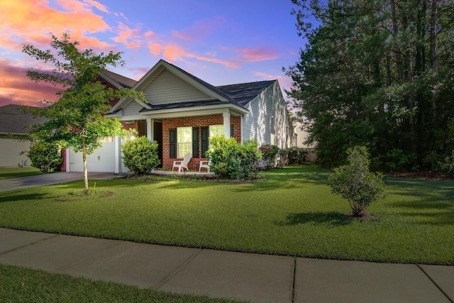 3639 Pimmit Pl, Ladson, SC 29456 - view of front of house with concrete driveway, an attached garage, brick siding, a lawn, and a shingled roof