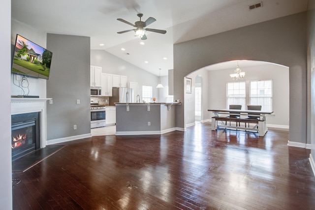 3639 Pimmit Pl, Ladson, SC 29456 - living room with arched walkways, a ceiling fan, plenty of natural light, high vaulted ceiling, and dark wood-style floors