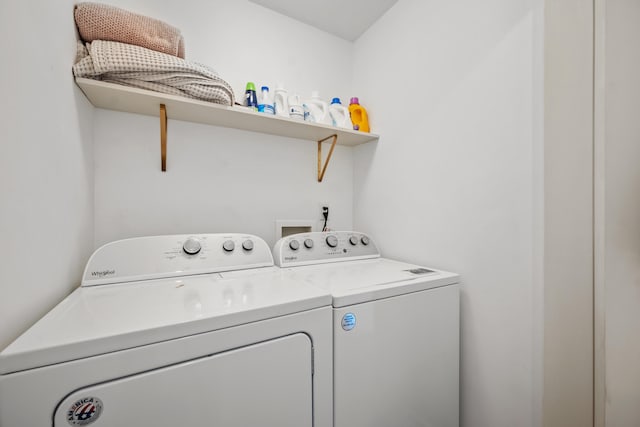 laundry room featuring washer and clothes dryer