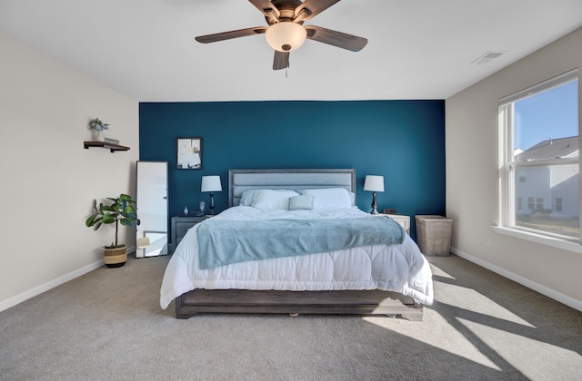 bedroom featuring ceiling fan and carpet floors