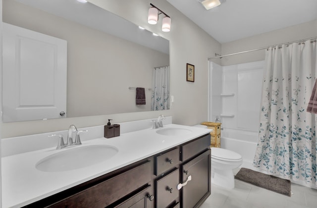 full bathroom featuring tile patterned floors, vanity, shower / tub combo, and toilet