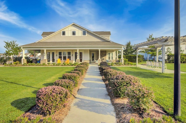 view of front facade featuring a front yard, a porch, and a pergola