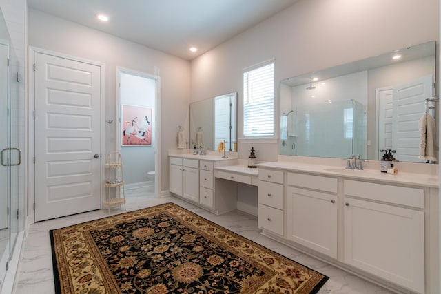 397 Woodgate Way, Summerville, SC 29485 - bathroom featuring recessed lighting, marble finish floor, a sink, a shower stall, and two vanities