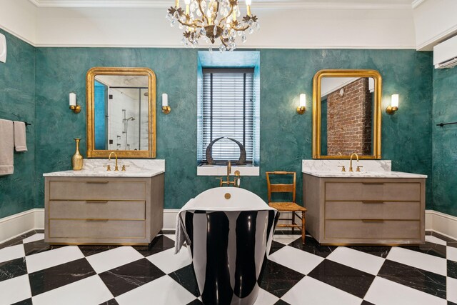 bathroom with a sink, a shower stall, two vanities, and tile patterned floors