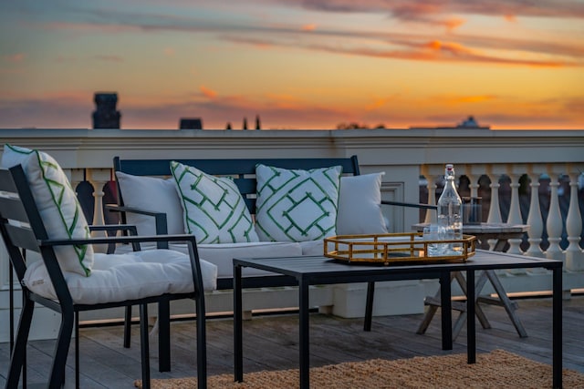 view of wooden balcony featuring an outdoor hangout area and a wooden deck