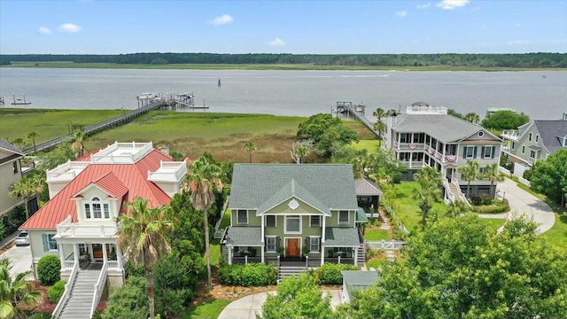 birds eye view of property featuring a water view