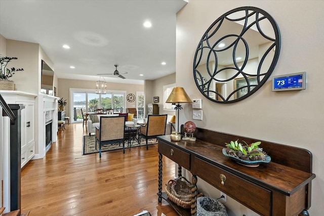 interior space featuring light wood finished floors and recessed lighting